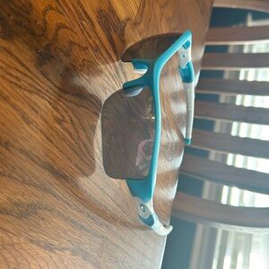 Blue and white oakley flak